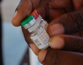 Public health nurses in Angola administer vaccines provided free by the government in remote communities as a means of promoting