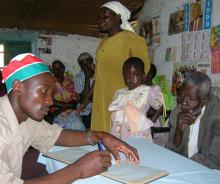 Field worker in Vihiga, Kenya registers HIV/AIDS orphans © 2006 Xoli Mahlalela, Courtesy of Photoshare