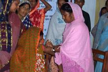 Description - A health worker administers a Somazet injection for family planning at a community health clinic in Islampur union, Rajbari district, Bangladesh. Source - © 2004 Ahsanul Kabir, Courtesy of Photoshare. A health worker administers a Somazet injection for family planning at a community health clinic