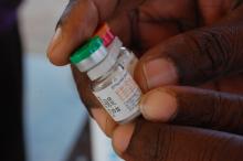 Public health nurses in Angola administer vaccines provided free by the government in remote communities as a means of promoting