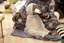 A malnourished and dehydrated infant is cared for at "Terre des Hommes" in Nouakchott, Mauritania.