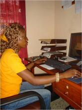 An adolescent female uses a computer in Sierra Leone. Src - © 2008 Veronica Thomas, Courtesy of Photoshare